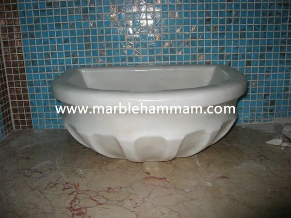Traditional monolith marble basins for the Turkish bath